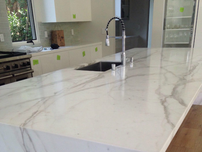 White marble kitchen tabletop cleaned and restored