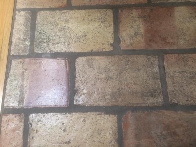 Reclaimed terracotta tiles in Palo Alto, refitted and regrouted