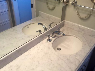 Polished, cleaned and sealed Carrara bathroom counter top