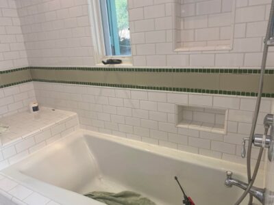 Bathroom caulking - installed and cleaned.