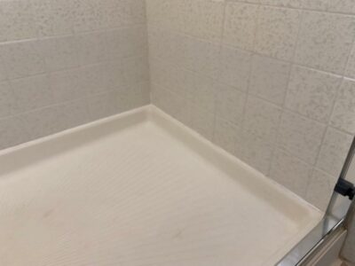 New caulking in a shower.